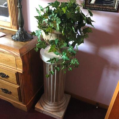 Numerous Doris and cor in Ethan style decorative stone pedestals with world class Deluxe Professional floral arrangements 