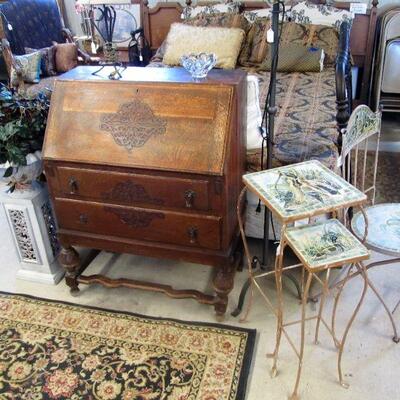 Antique secretary desk - we have 2 in different styles.  Pretty metal garden chair & nesting tables w/ mosaic tiles