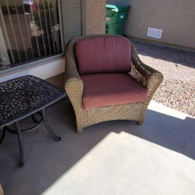 Woven wicker and cushion patio chairs