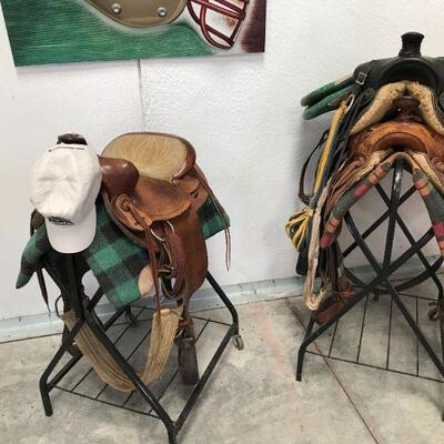 (3) saddles. The black saddle is from 1920's