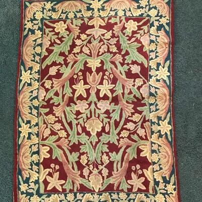 Silk woven small rug maroon tones