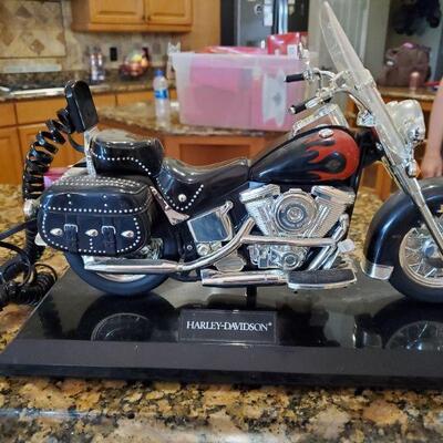 This is a real, working telephone in the shape of a Harley Davidson motorcycle