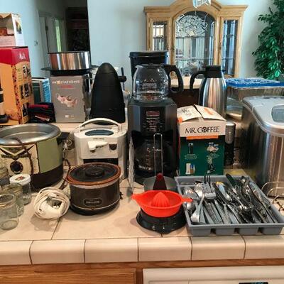 coffee pots, silverware and many household goods