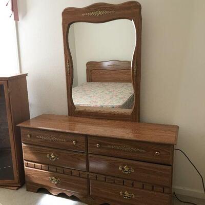 dresser with mirror in guest bedroom