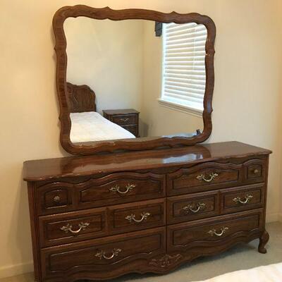 matching dresser with mirror in third guest bedroom