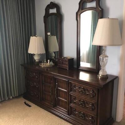 Dresser with two mirrors. Can be sold as a set with two bedside tables and a california king mattress and headboard, or may be purchased...
