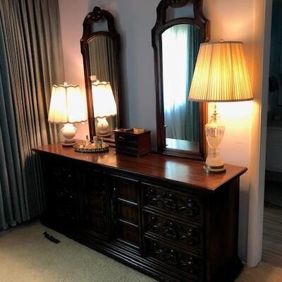 Dresser with two mirrors. Can be sold as a set with two bedside tables and a california king mattress and headboard, or may be purchased...