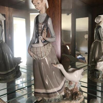Lladro Girl with Goose - discontinued piece 

Lots more Lladro pieces available. 