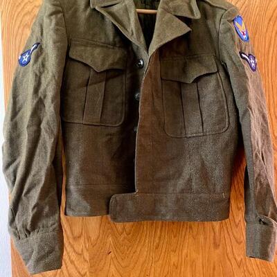 Eisenhower style jacket with patches.