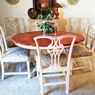 Lovely oval dining table. Has two leaves for extension and six chairs. Shabby chic at its best