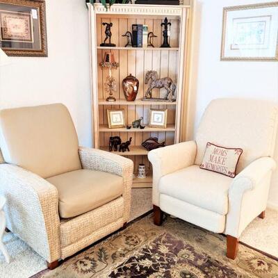 Pair of lazy boy recliners one is upholstered the other has upholstery and leather. Beautiful bookcase w/accessories
