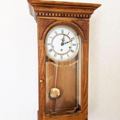 Beautiful oak Howard Miller chiming wall clock