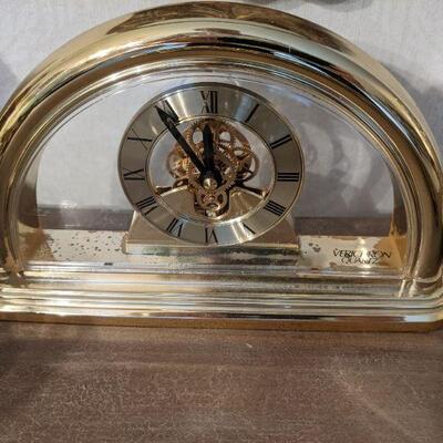 Small brass tone clock