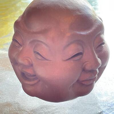 4 faces of Budha head (other side)