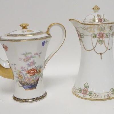 1044	TWO PIECE LOT INCLUDES A THEODORE HAVILAND DEMITASSE POT & A HAND PAINTED NIPPON CHOCOLATE POT. TALLEST IS 9 IN 
