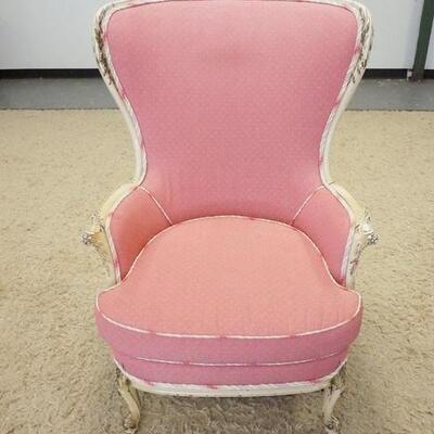 1027	CARVED UPHOLSTERED ARM CHAIR, FRAME IS PAINTED WHITE. 32 IN W, 43 1/2 IN H 
