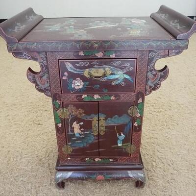 1056	PAINT DECORATED ASIAN CABINET, ONE DRAWER & 2 DOORS, TOP DECORATION FEATURES A MAN RIDING A FLYING CRANE, 29 IN WIDE X 33 1/2 IN HIGH
