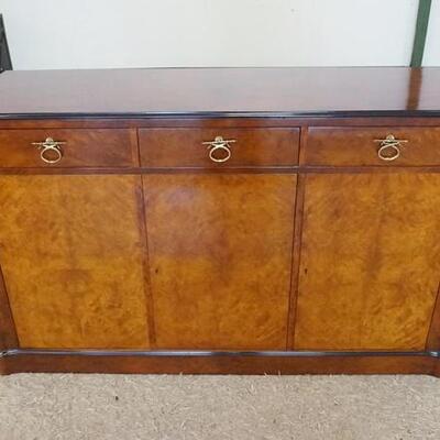 1040	3 DRAWER 3 DOOR SIDEBOARD. 64 IN W, 38 IN H 
