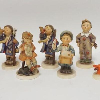 1097	GROUP OF 9 HUMMEL FIGURES, TALLEST IS 6 IN
