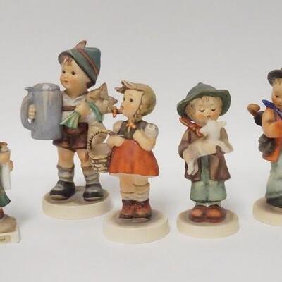 1042	GROUP OF 5 HUMMEL FIGURES. TALLEST IS 5 3/4 IN 
