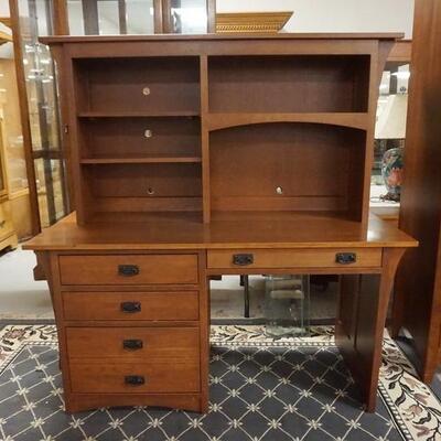1018	2 PIECE DESK W/ OPEN SHELF TOP. HAS 4 DRAWERS INCLUDING A FILE DRAWER. 60 IN W 
