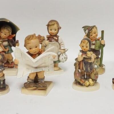 1099	GROUP OF 8 HUMMEL FIGURES W/STORMY WEATHER, TALLEST IS 6 IN
