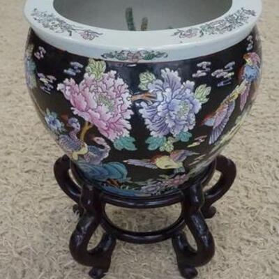 1058	HAND PAINTED ASIAN JARDENIERE ON A WOODEN BASE, TOTAL HEIGHT 20 1/2 IN, TOP DIAMETER 14 1/4 IN
