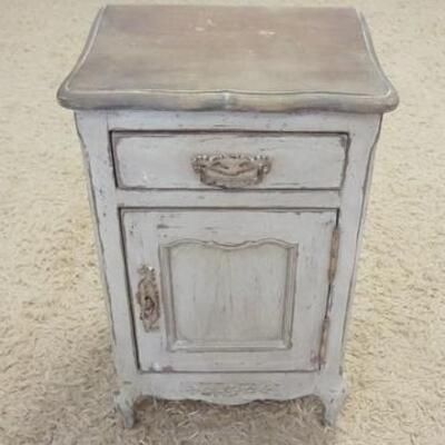 1023	PAINT DECORATED 1 DRAWER 1 DOOR STAND HAS DISTRESSED STYLE FINISH. 16 1/4 IN X 14 IN, 25 1/2 IN H 
