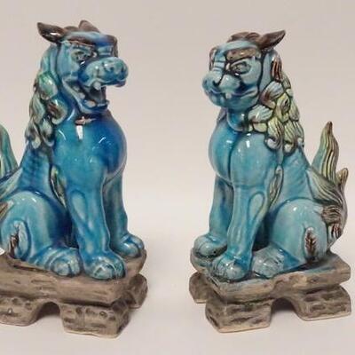 1045	PAIR OF AQUA GLAZED FOO DOGS, ONE HAS NICK ON TOOTH, 8 IN H 
