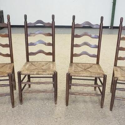 1038	SET OF 4 LADDER BACK RUSH SEAT CHAIRS. 18 1/2 IN W, 42 1/2 IN H 
