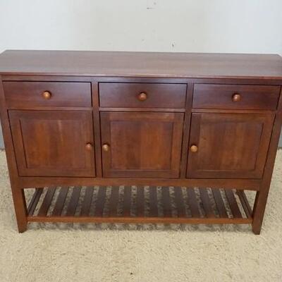 1015	ETHAN ALLEN CHERRY SIDEBOARD *AMERICAN EXPRESSIONS*  3 DRAWERS, 3 DOORS, HAS A BOTTOM SHELF.  64 IN W, 40 IN H.
