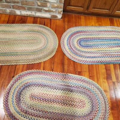 Set of three LL Bean reversible rugs. They measure 27x49