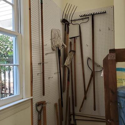 Assorted yard tools includes pitchforks, rakes and shovels. https://ctbids.com/#!/individualEstateSales/316/10496