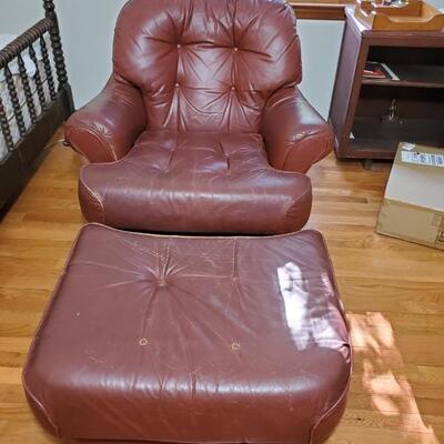 Mahogany leather easy chair and matching ottoman made by Classic Leather. Chair 40