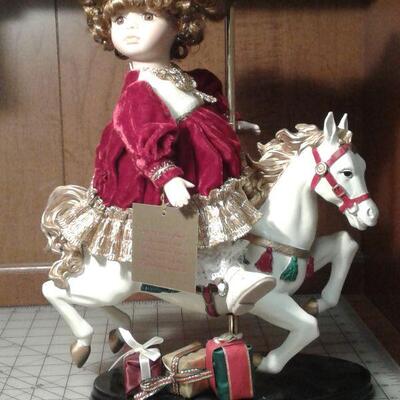 https://www.ebay.com/itm/124755335345	LY8069 Retro 1980s Porcelain doll on carousel horse Pickup Only
