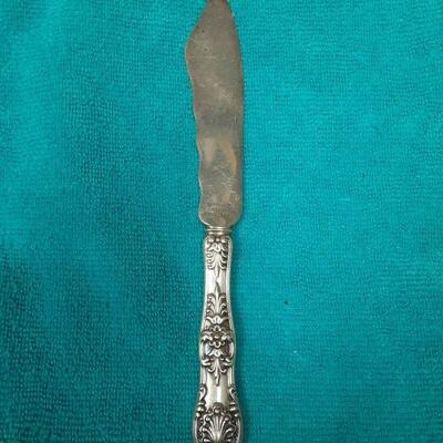 https://www.ebay.com/itm/124758570308	ME3004  USED  TIFFANY & CO. STERLING SILVER FISH KNIFE ENGLISH KING PATTERN
