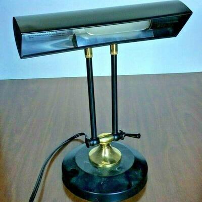 https://www.ebay.com/itm/124755335347	KG0066 SMALL BLACK DESK LAMP WITH ADJUSTABLE ARM
