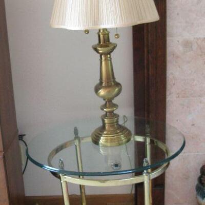 brass and glass end tables, there are 2                                                   buy it now $ 55.00 each 