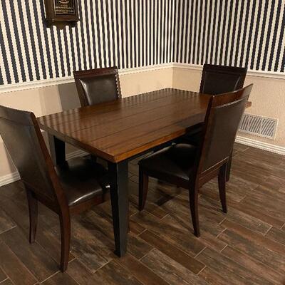 kitchen table with 4 leather chairs