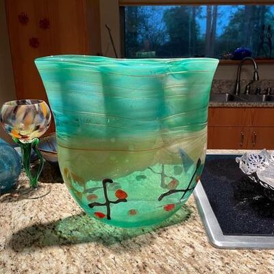 Flat green vase w/x's