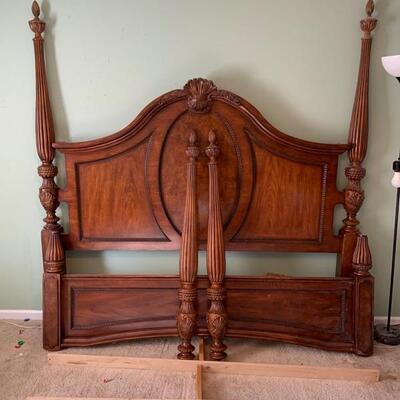 This is a gorgeous king sized bed headboard and footboard with support slats and posts. The pieces are covered in beautiful scroll work...