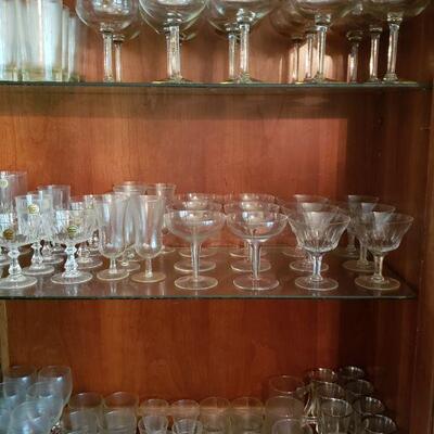 Lots of crystal stemware and glasses