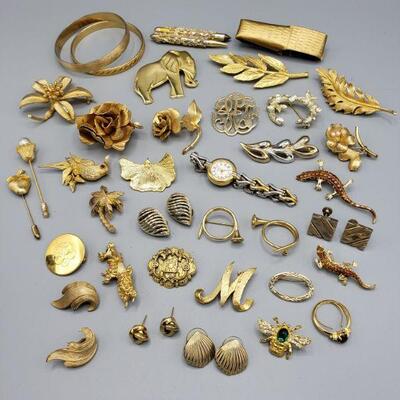 Includes pendants, cufflinks, Monet bracelets, Anne Klein watch, Avon ring and earrings....
