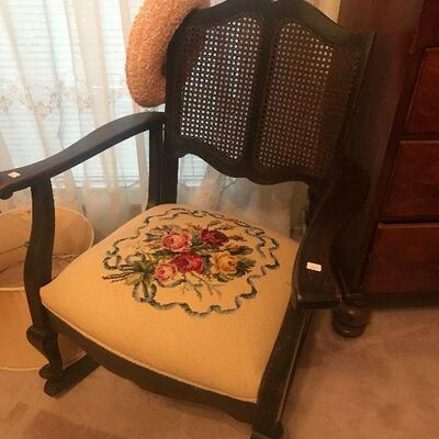 Antique Needlepoint Rocker with wicker back