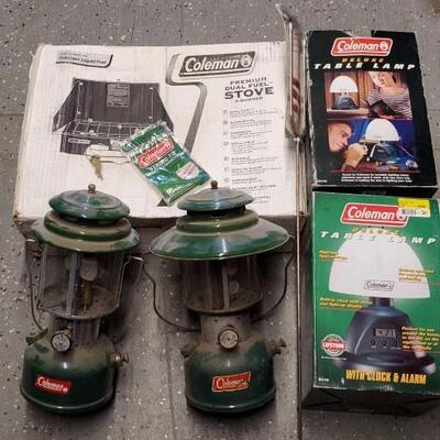 #5102 â€¢ Dual Fuel Stove, 2 Coleman Table Lamp, 2 Coleman Lanterns, and A Camp Fork