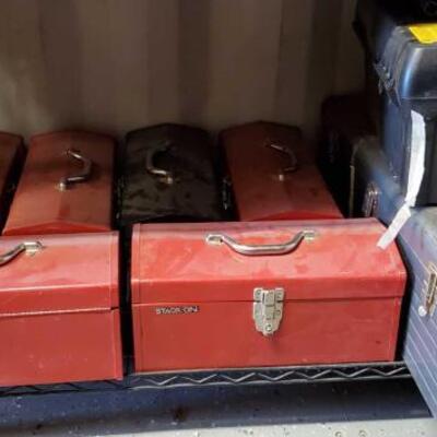 
#5106 â€¢ 8 Tool Boxes Full Of Hardware Tools, Sand Paper, Saws, Fishing Reels, and More