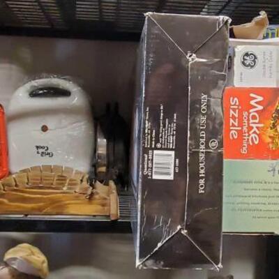 
#5076 â€¢ 2 Lanterns, Electric Griddle, Double Burner, Toast Master, Antique Spoon Display, and More