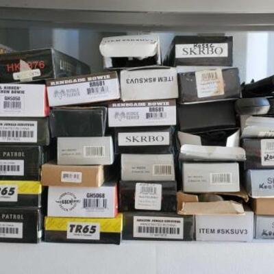

#5236 â€¢ Approx 49 Knives, Machetes, With Sheaths, and More