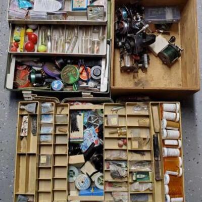 
#5122 â€¢ 2 Tackle Boxes Full Of Fishing Supplies, A Wooden Box Full Of Fishing Reels