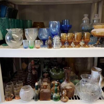 
#5024 â€¢ 2 Shelves of Vintage Glassware, Includes Decanters, Water Despencers, and More